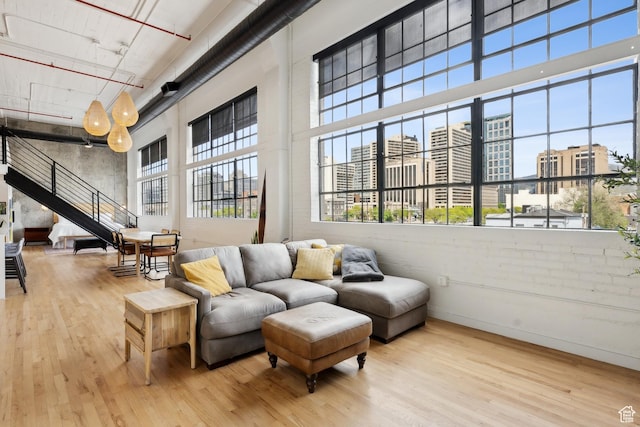 building lobby with a high ceiling, a city view, and stairs