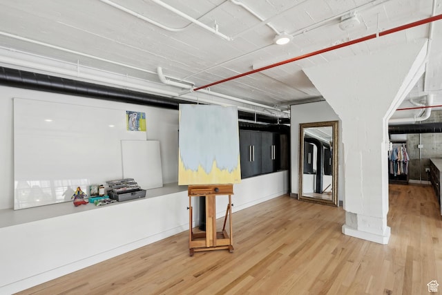 basement with wood finished floors