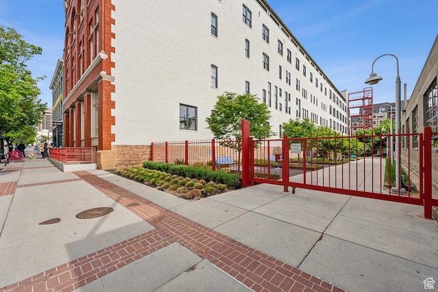 view of property with fence