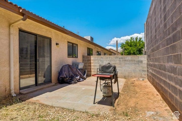 view of patio with fence