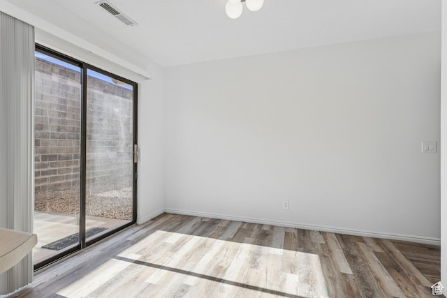 1075 N 1400 W Unit 32, St George, UT 84770 - unfurnished room featuring wood finished floors and baseboards