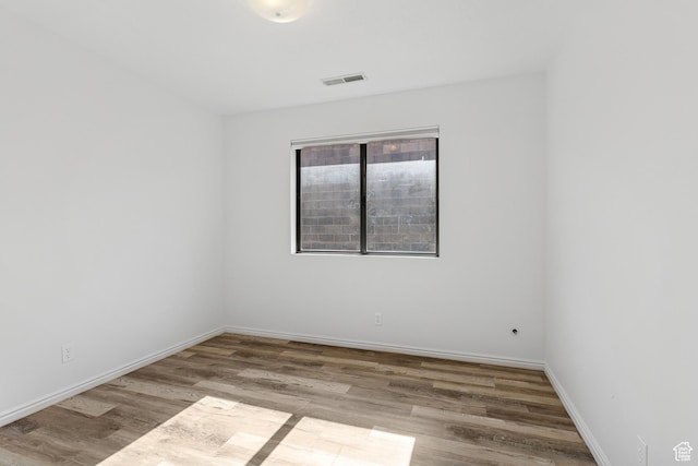 1075 N 1400 W Unit 32, St George, UT 84770 - spare room with wood finished floors and baseboards