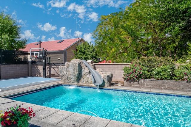 684 S 990 W, Hurricane, UT 84737 - view of swimming pool featuring a water slide and a fenced backyard
