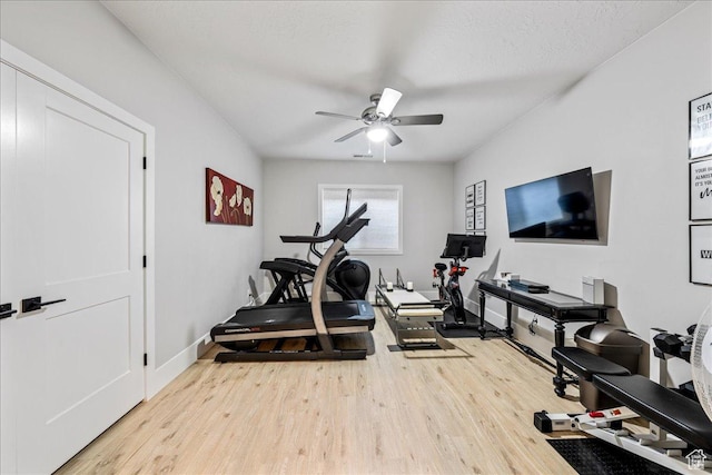 684 S 990 W, Hurricane, UT 84737 - exercise area featuring wood finished floors, a ceiling fan, and baseboards