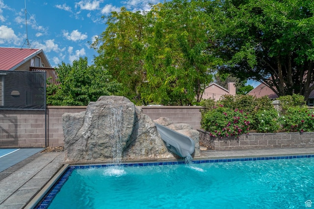 684 S 990 W, Hurricane, UT 84737 - view of swimming pool with a water slide and fence