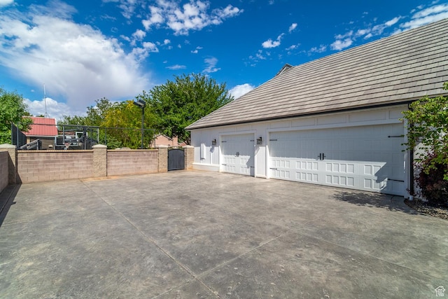 684 S 990 W, Hurricane, UT 84737 - garage featuring a gate and fence