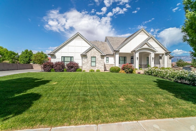 684 S 990 W, Hurricane, UT 84737 - view of front of property with stone siding, a front lawn, and stucco siding
