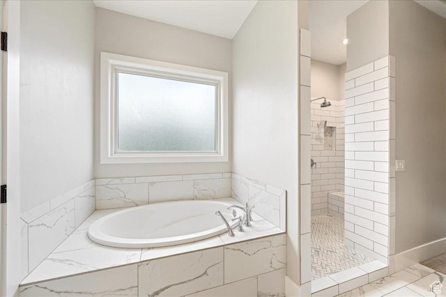 684 S 990 W, Hurricane, UT 84737 - bathroom with a tile shower, a garden tub, marble look tiles, and baseboards