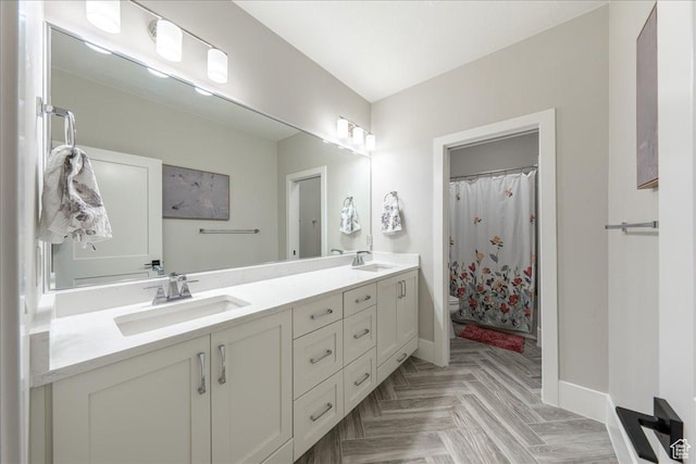 684 S 990 W, Hurricane, UT 84737 - full bathroom with toilet, baseboards, double vanity, and a shower with curtain