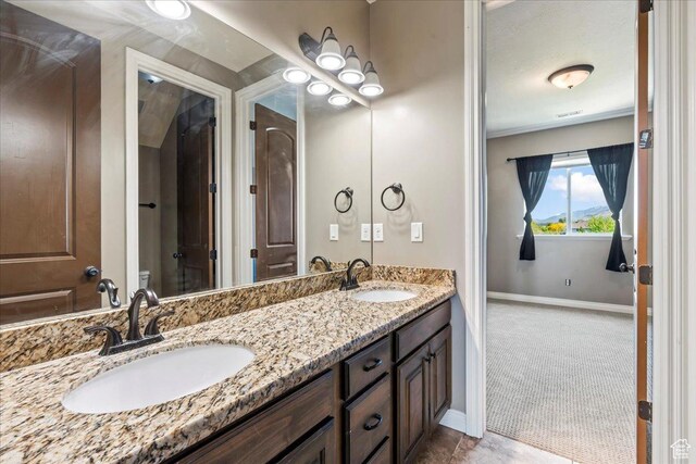 916 Country Ln, Farmington, UT 84025 - full bathroom featuring baseboards and double vanity