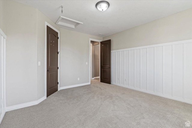 916 Country Ln, Farmington, UT 84025 - unfurnished bedroom featuring attic access, carpet floors, and baseboards