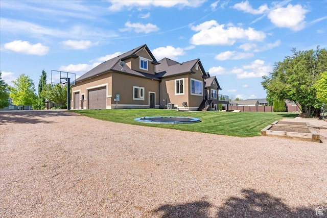 916 Country Ln, Farmington, UT 84025 - view of side of property featuring stucco siding, a garden, and driveway