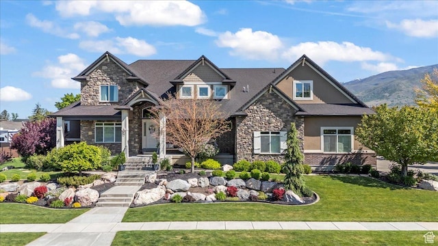 916 Country Ln, Farmington, UT 84025 - craftsman-style house featuring stone siding, stucco siding, a front yard, and a mountain view