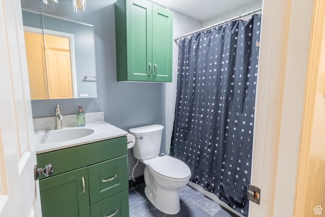 bathroom with toilet, vanity, tile patterned floors, and a shower with shower curtain