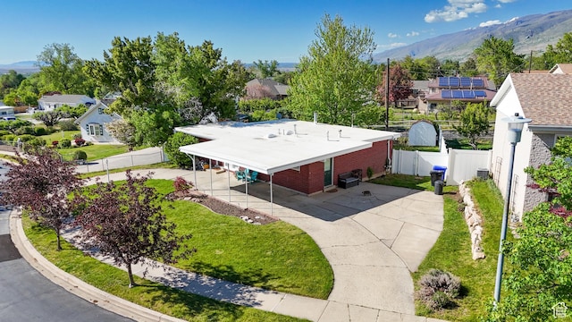 aerial perspective of suburban area with a mountain backdrop