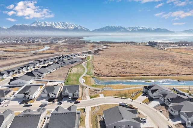aerial view of residential area with a water and mountain view
