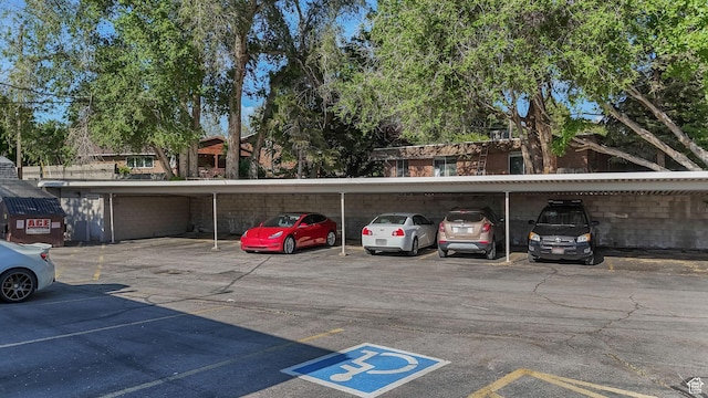 view of partially covered parking lot