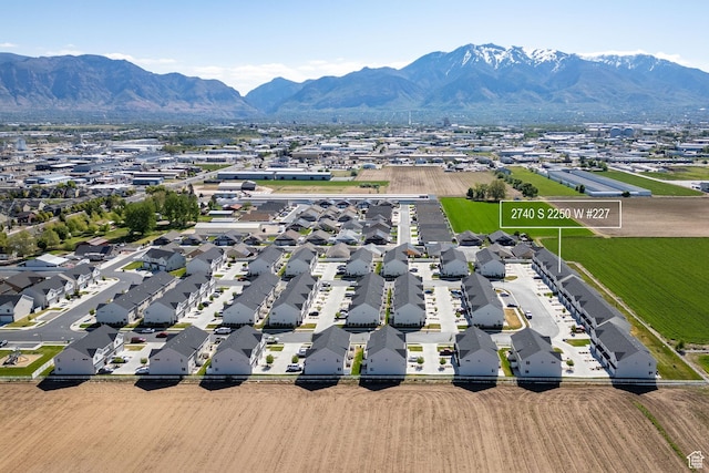 aerial perspective of suburban area with a mountainous background