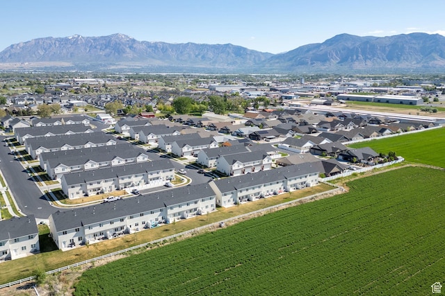 aerial view of residential area with a mountainous background
