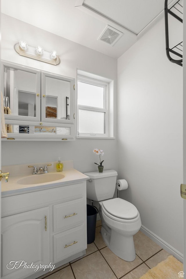 180 N 1100 E Unit 116, Washington, UT 84780 - half bathroom with tile patterned floors, toilet, and vanity