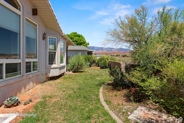 180 N 1100 E Unit 116, Washington, UT 84780 - view of grassy yard featuring a mountain view