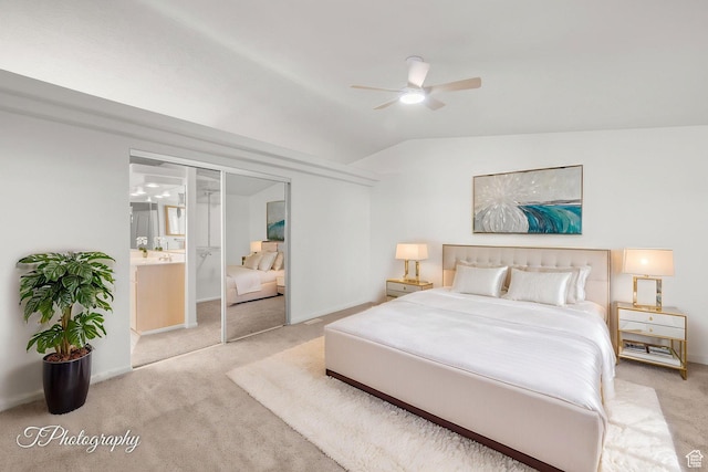 180 N 1100 E Unit 116, Washington, UT 84780 - bedroom featuring light colored carpet, lofted ceiling, baseboards, connected bathroom, and ceiling fan