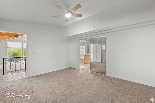 180 N 1100 E Unit 116, Washington, UT 84780 - carpeted empty room featuring ceiling fan, lofted ceiling, and baseboards