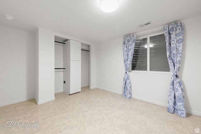 180 N 1100 E Unit 116, Washington, UT 84780 - unfurnished bedroom with light carpet, a closet, and baseboards