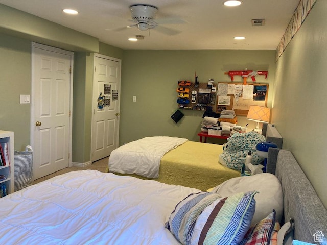 carpeted bedroom with recessed lighting and a ceiling fan