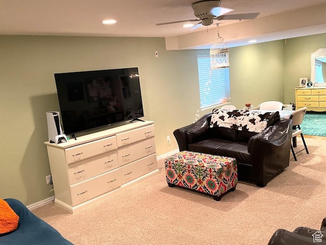 carpeted living room featuring ceiling fan, recessed lighting, and baseboards