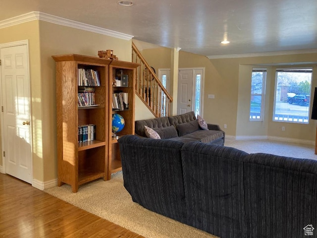 living room with baseboards, stairs, wood finished floors, crown molding, and recessed lighting