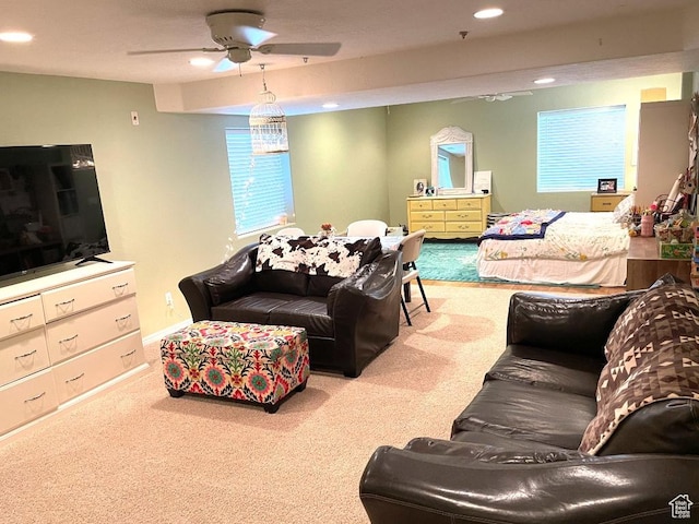 living room featuring carpet, ceiling fan, and recessed lighting