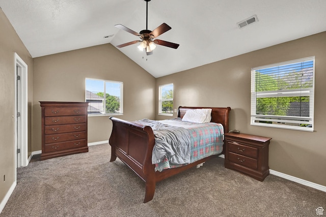 bedroom featuring baseboards, carpet flooring, vaulted ceiling, and a ceiling fan