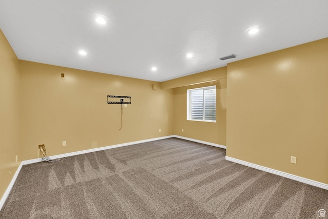 unfurnished room with carpet floors, baseboards, and recessed lighting