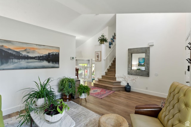 1298 E 5875 S, Ogden, UT 84405 - living room with stairs, wood finished floors, baseboards, and vaulted ceiling