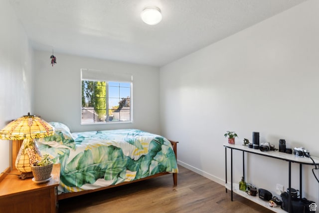 1298 E 5875 S, Ogden, UT 84405 - bedroom featuring wood finished floors and baseboards
