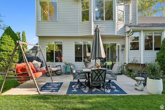 1298 E 5875 S, Ogden, UT 84405 - rear view of property with a patio area and a yard