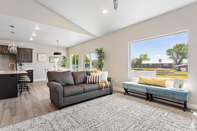 3287 S 4950 W, West Haven, UT 84401 - living room featuring light wood-style floors, baseboards, lofted ceiling, and recessed lighting