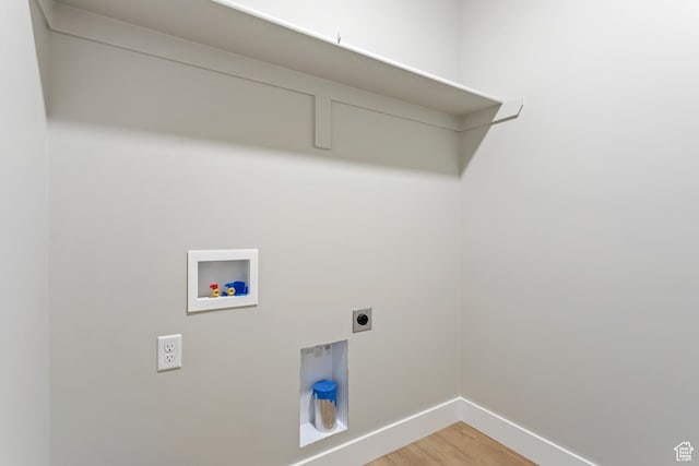 3287 S 4950 W, West Haven, UT 84401 - clothes washing area with washer hookup, hookup for an electric dryer, baseboards, and light wood finished floors