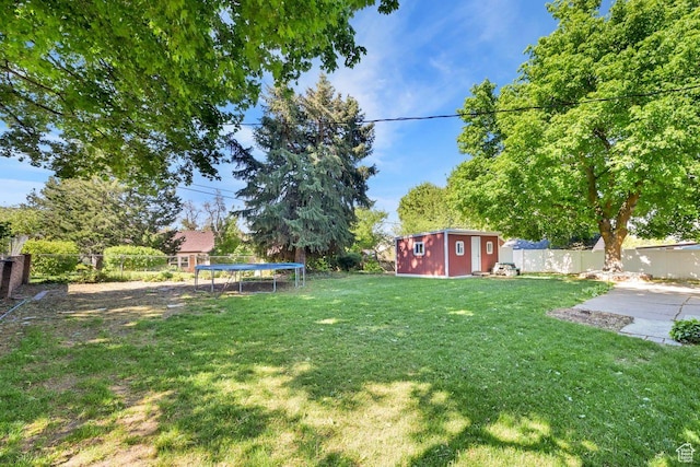 1375 E 3100th St S, Ogden, UT 84403 - view of yard featuring a trampoline, a shed, an outdoor structure, and a patio area
