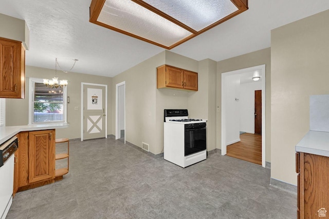 1375 E 3100th St S, Ogden, UT 84403 - kitchen with white appliances, a chandelier, light countertops, brown cabinetry, and decorative light fixtures