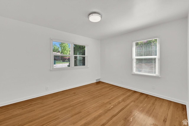 1375 E 3100th St S, Ogden, UT 84403 - spare room with light wood-style flooring and baseboards