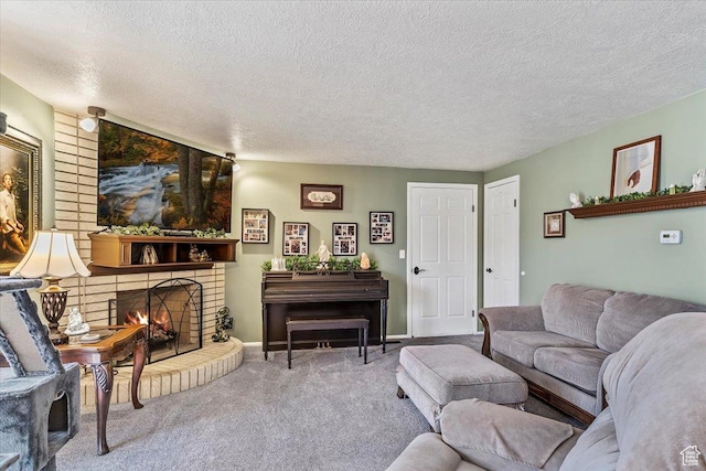 living room with carpet flooring, a fireplace, and a textured ceiling