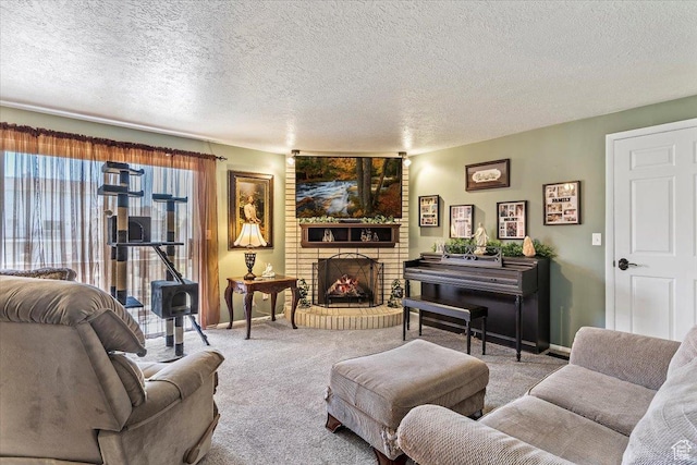 carpeted living room with a fireplace, baseboards, and a textured ceiling