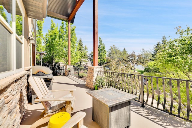 view of patio / terrace featuring a balcony