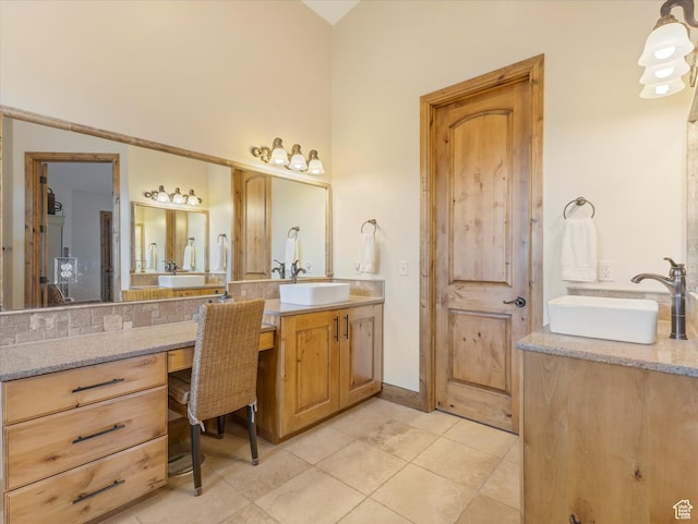 full bathroom featuring vanity and tile patterned floors