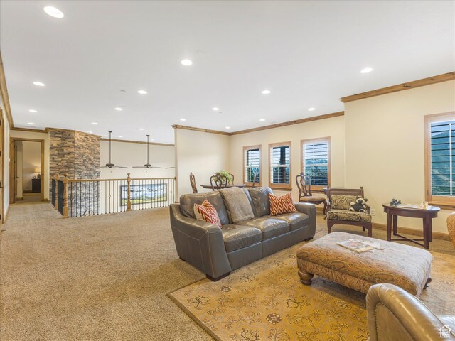 carpeted living room with recessed lighting, ornamental molding, and ceiling fan