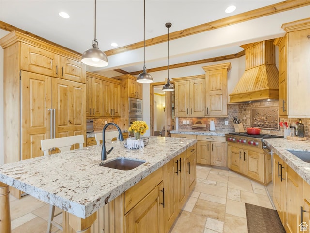 kitchen featuring a sink, stainless steel appliances, custom range hood, light brown cabinetry, and decorative backsplash