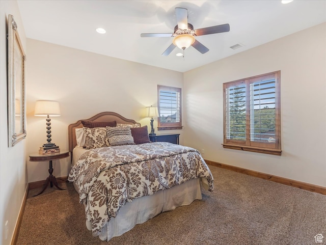 carpeted bedroom with baseboards, multiple windows, recessed lighting, and ceiling fan