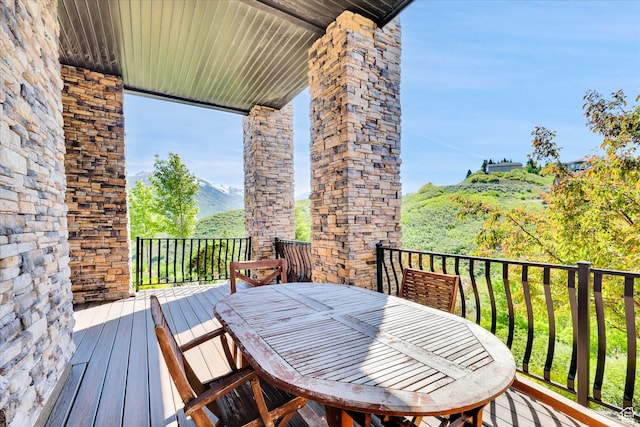 deck featuring outdoor dining area